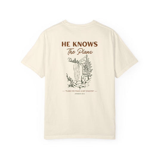 Beige t-shirt with text and graphic design on a white background